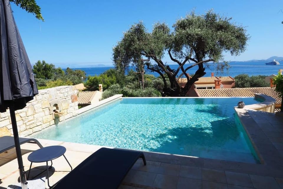 Patio, Day, Natural landscape, Pool view, Sea view, Swimming pool, sunbed