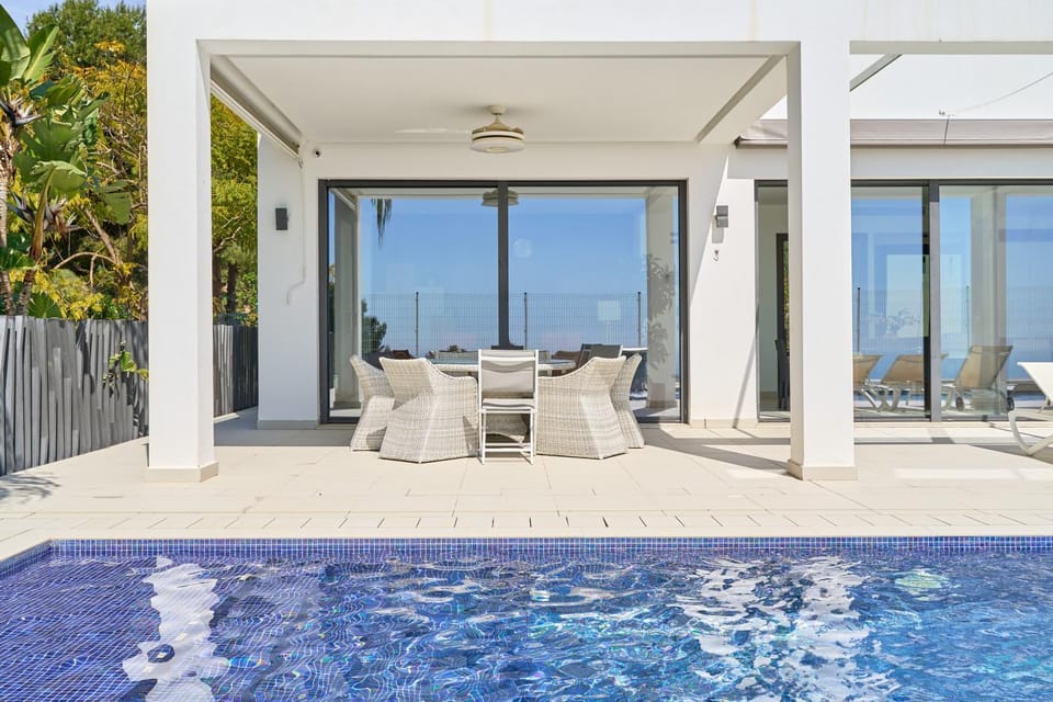 Property building, Living room, Swimming pool