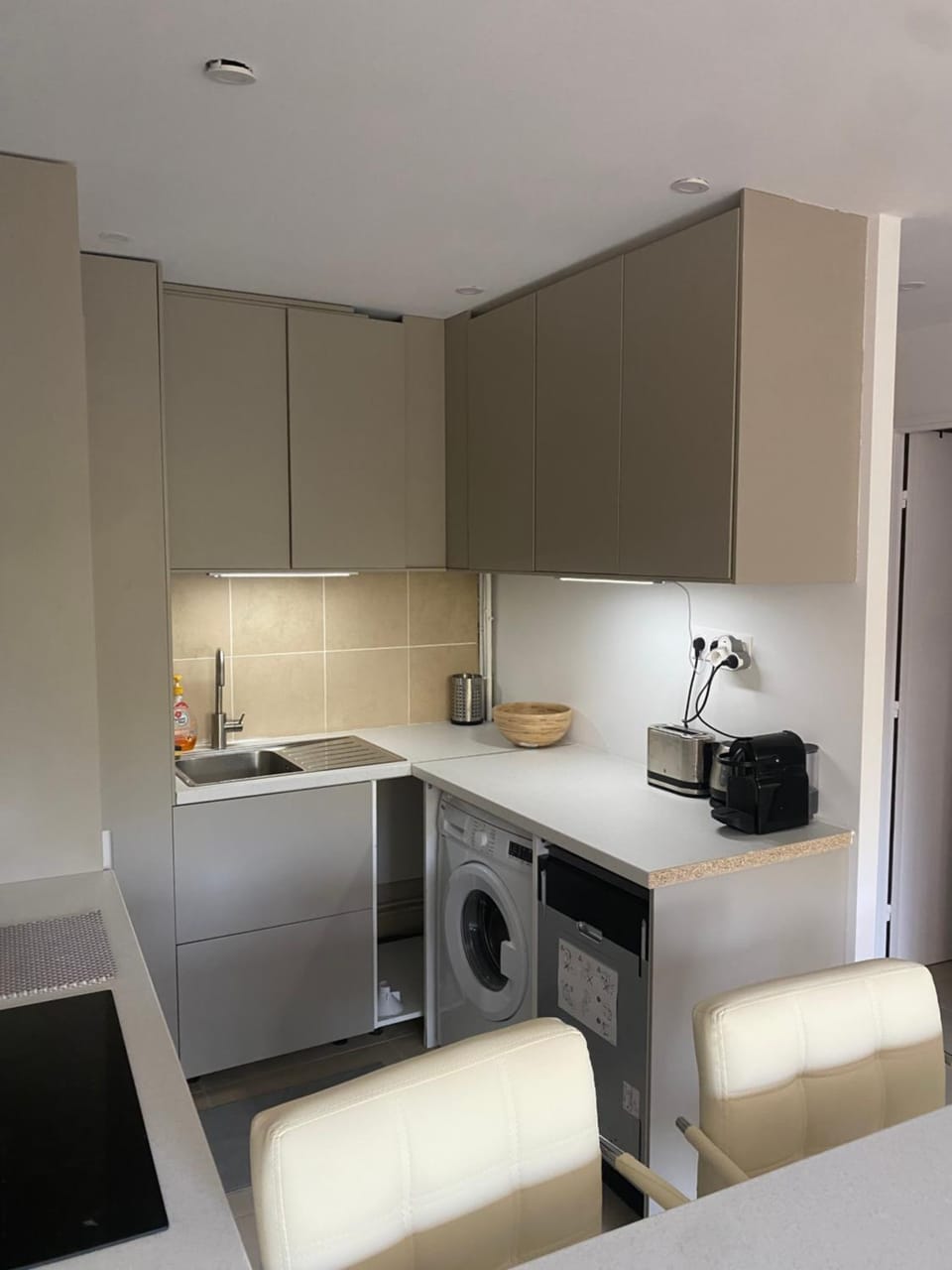 Kitchen or kitchenette, dishwasher, oven, stove, toaster