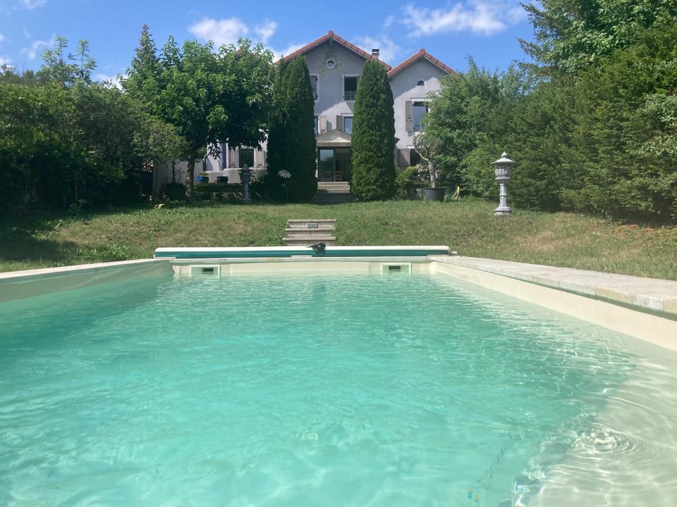 Property building, Living room, Swimming pool