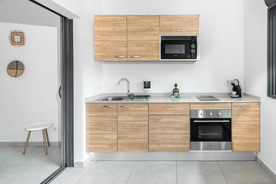 Kitchen or kitchenette, oven, stove