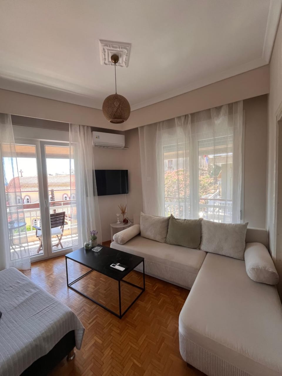 Bed, TV and multimedia, Living room, Seating area, air conditioner
