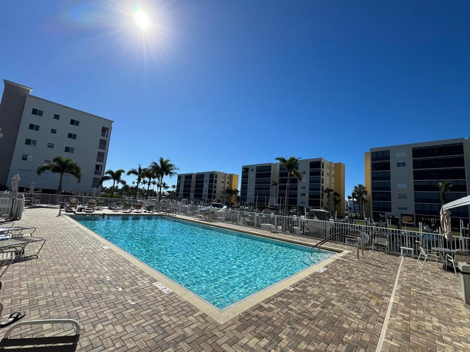 Property building, Seating area, Swimming pool