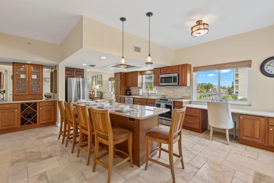Kitchen or kitchenette, Seating area, Dining area, Lake view, furniture, microwave, oven, stove, kitchen