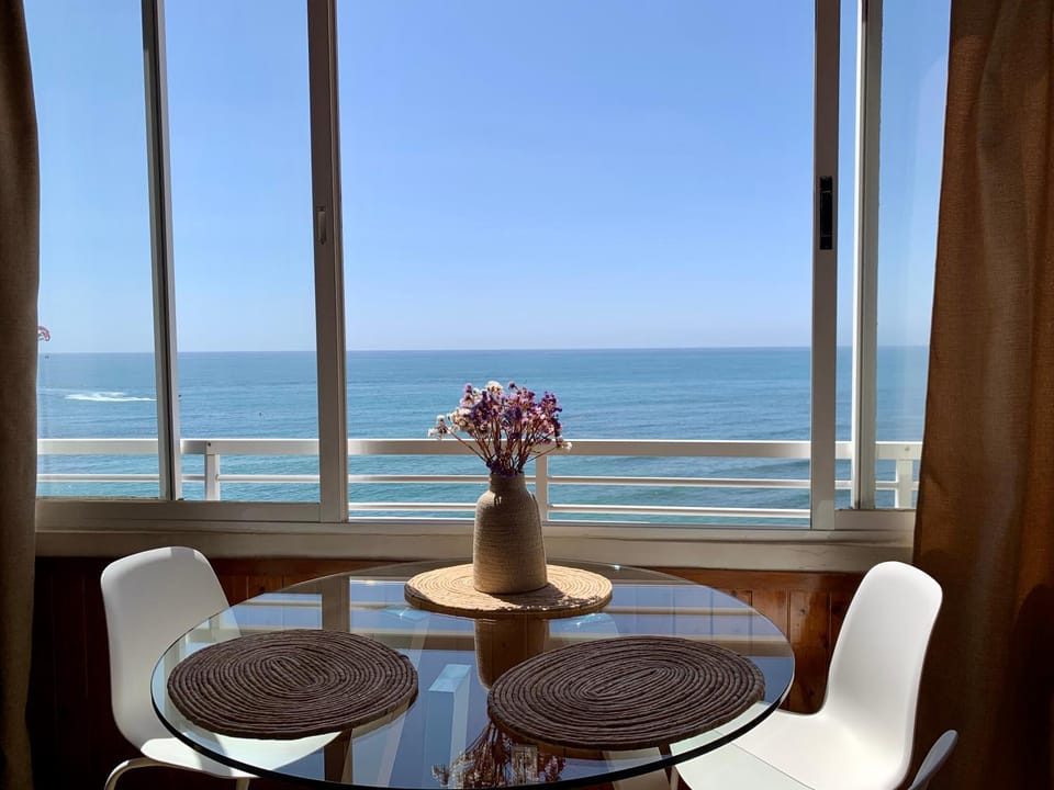 View (from property/room), Balcony/Terrace, Living room, Seating area, Dining area, Sea view