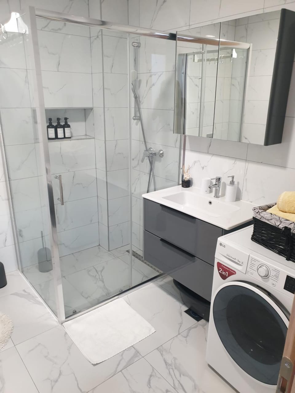 Shower, Toilet, Bathroom, towels, washing machine, dryer