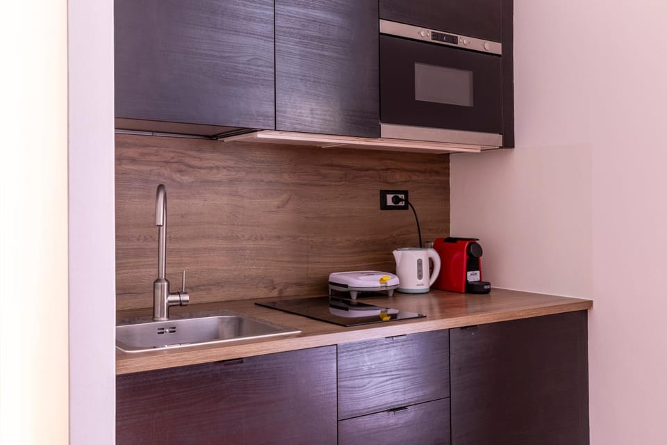 Kitchen or kitchenette, stove