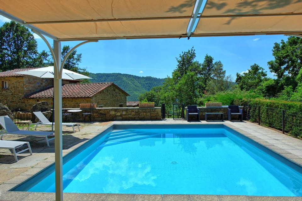 Patio, Day, Natural landscape, Pool view, Swimming pool, sunbed