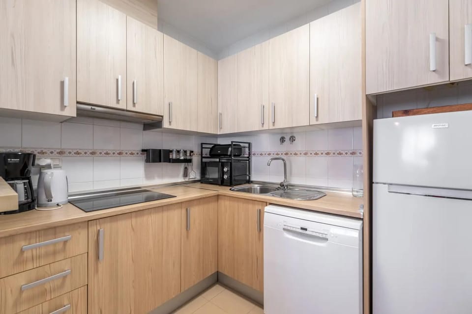 Kitchen or kitchenette, dishwasher, microwave, stove, kitchen