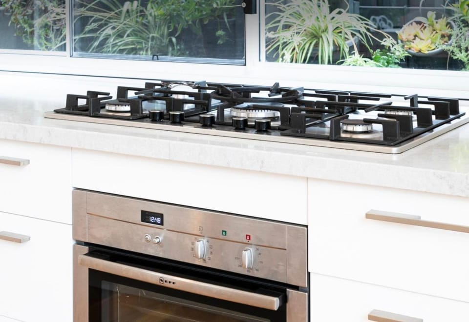 Kitchen or kitchenette, stove