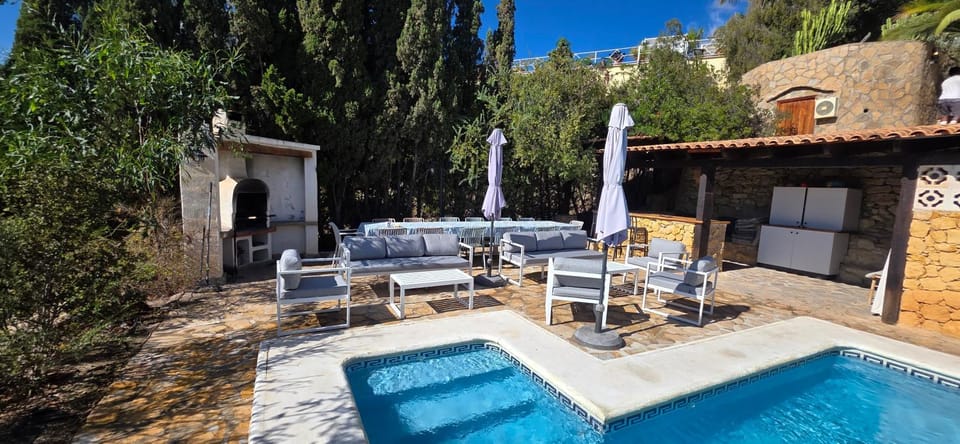 Property building, Day, Dining area, Pool view, Swimming pool