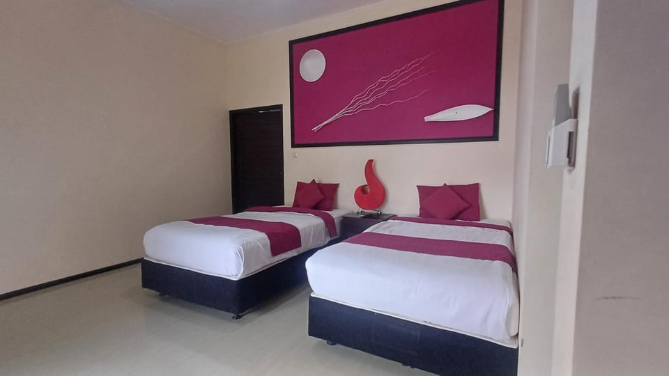 Melaya beach resort Twin bed Resort in Bali