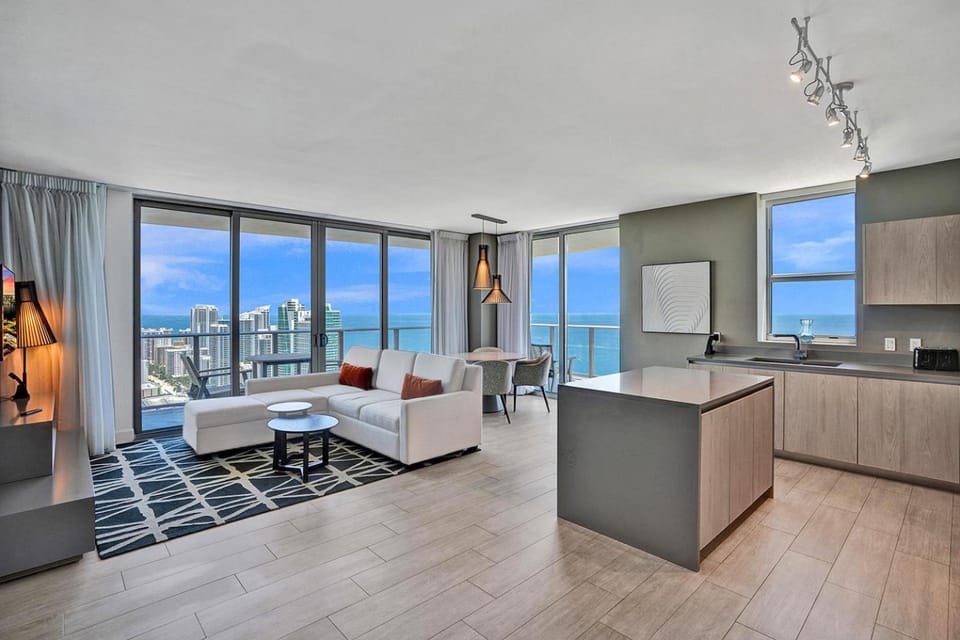 Kitchen or kitchenette, Living room, Seating area, Dining area, Sea view