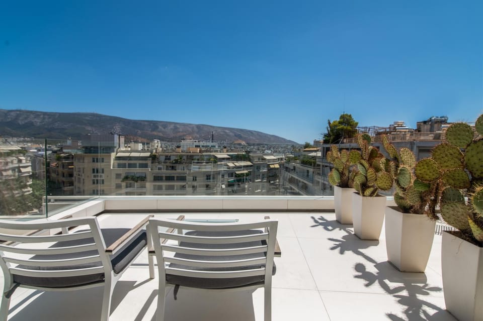 Patio, Day, Natural landscape, View (from property/room), Balcony/Terrace, Living room, Seating area, City view, Mountain view