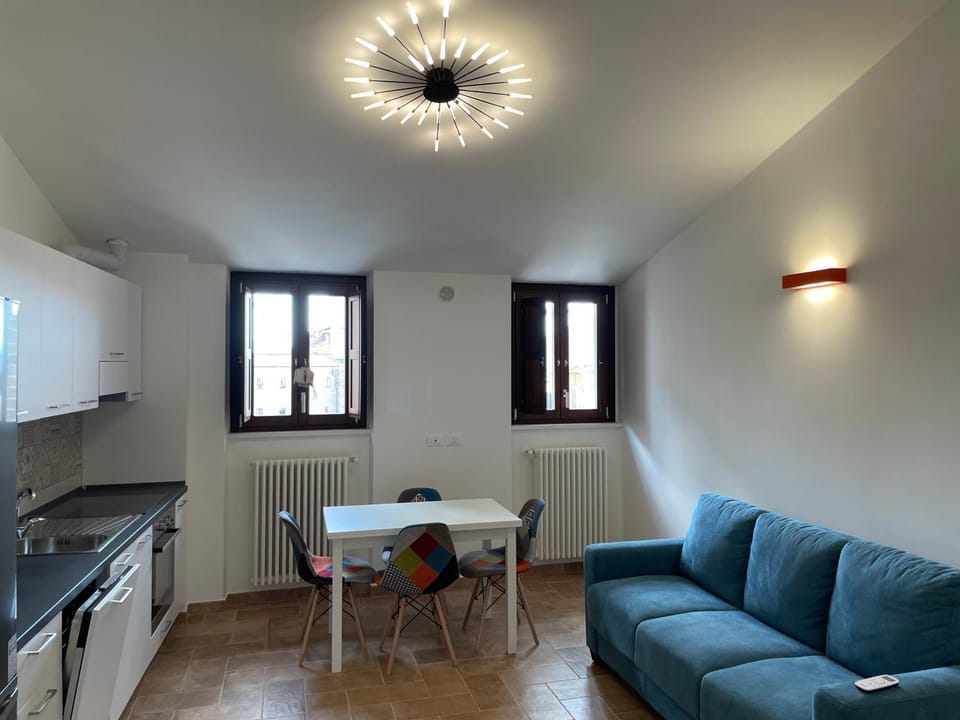 Kitchen or kitchenette, Living room, Seating area, Dining area