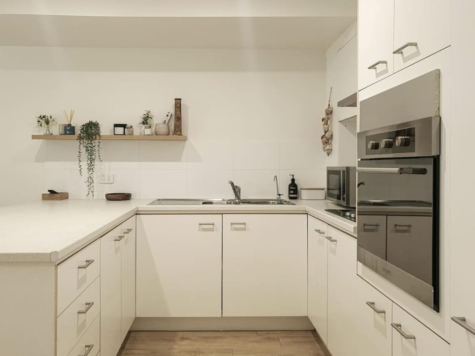 Kitchen or kitchenette, oven, stove