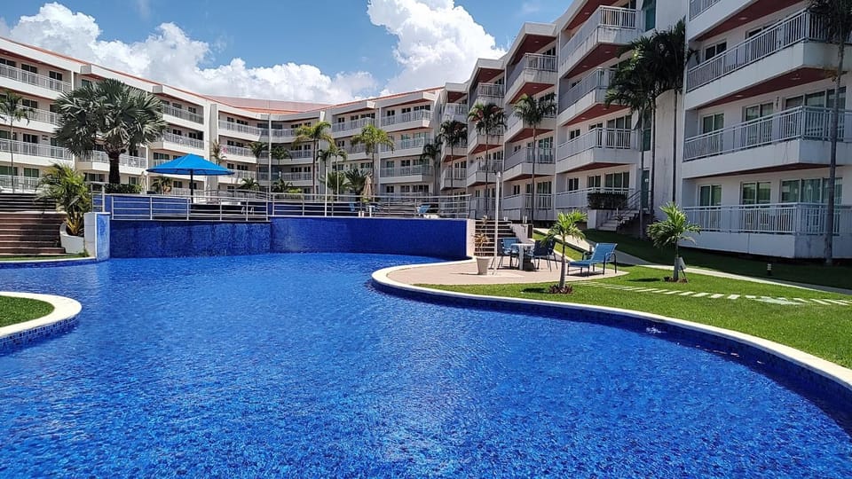 Property building, Day, Pool view, Swimming pool, sunbed