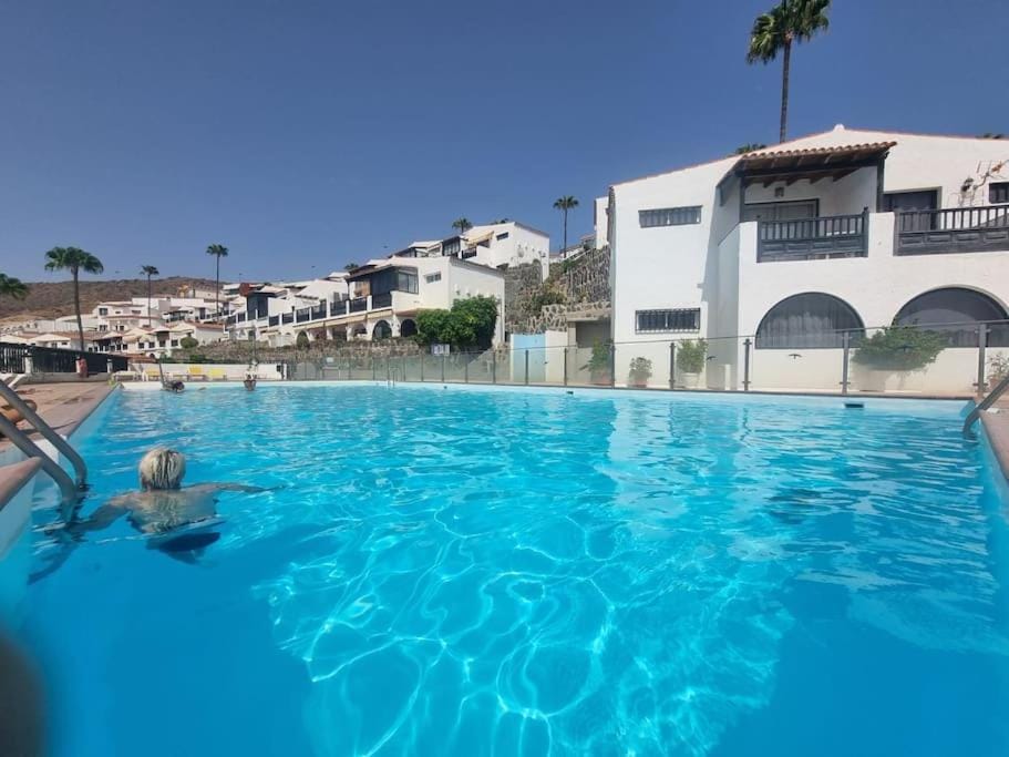 Property building, Day, Natural landscape, Pool view, Swimming pool, sunbed