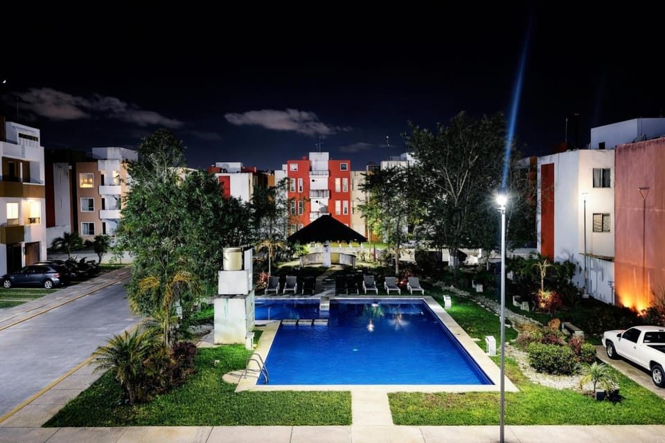 Property building, Night, Swimming pool