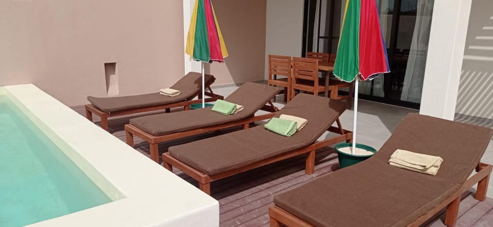 Swimming pool, sunbed