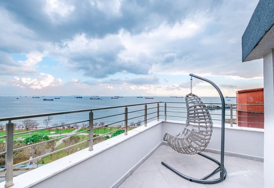 Patio, Day, View (from property/room), Balcony/Terrace, Living room, Seating area, Sea view
