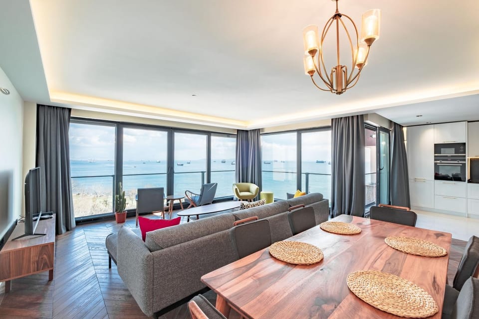 Bed, TV and multimedia, Living room, Seating area, Dining area