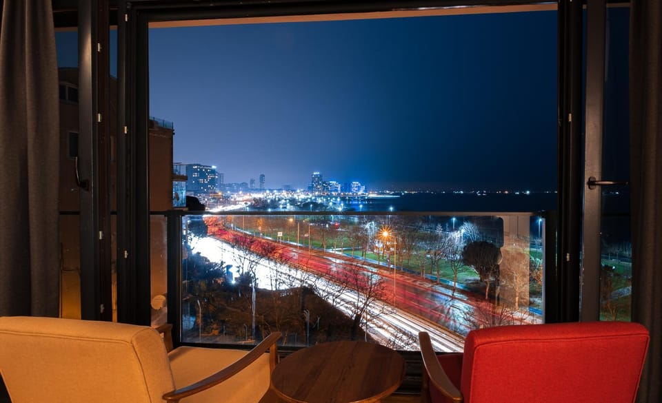 Night, Natural landscape, Living room, Seating area, City view, Sea view