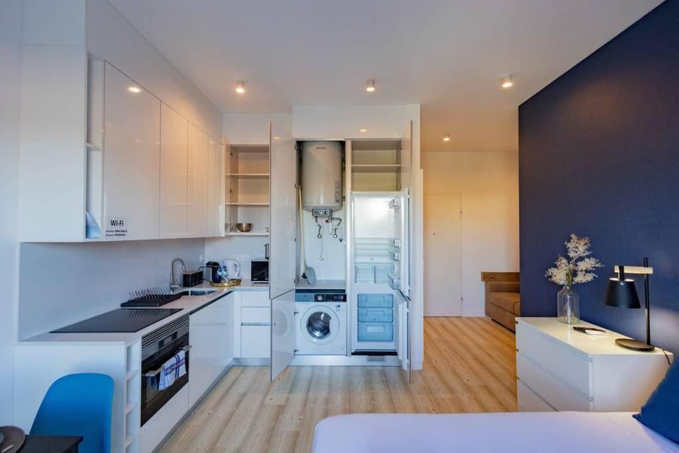Kitchen or kitchenette, dishwasher, stove, washing machine