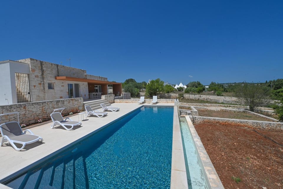 Property building, Living room, Swimming pool