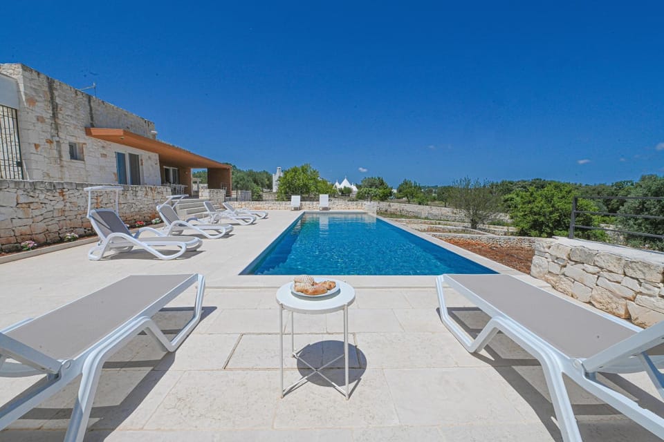 Property building, Living room, Swimming pool