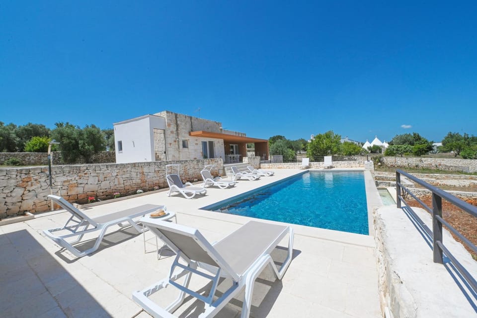 Property building, Living room, Swimming pool