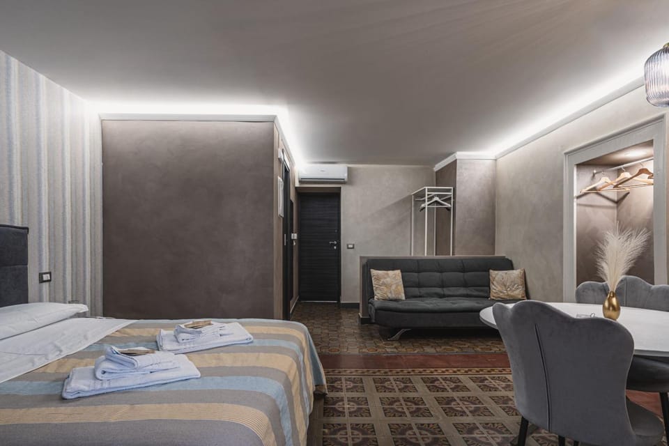 Bed, Living room, Photo of the whole room, Seating area, Bedroom, towels, wardrobe