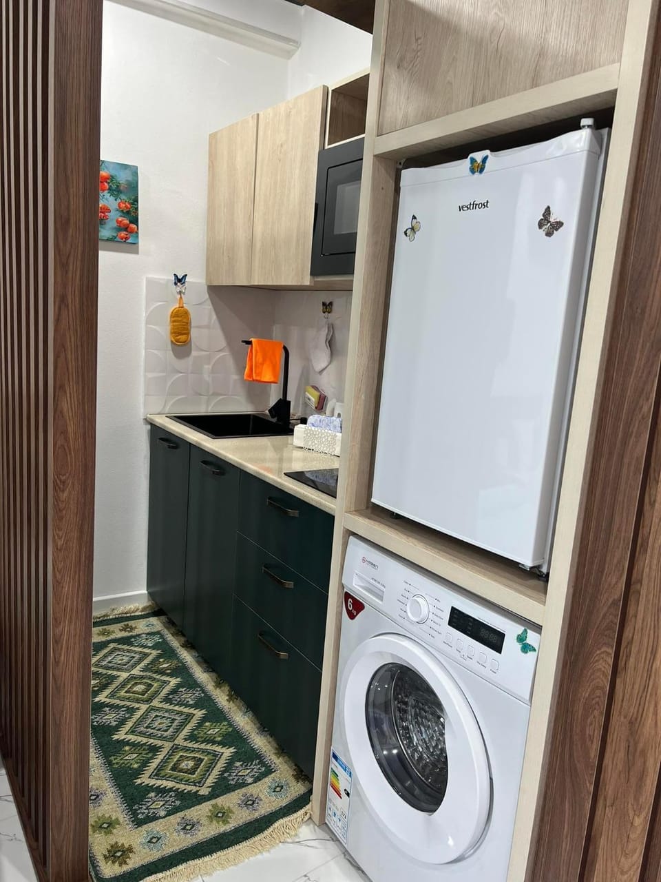 Kitchen or kitchenette, dishwasher, minibar, oven, stove, washing machine
