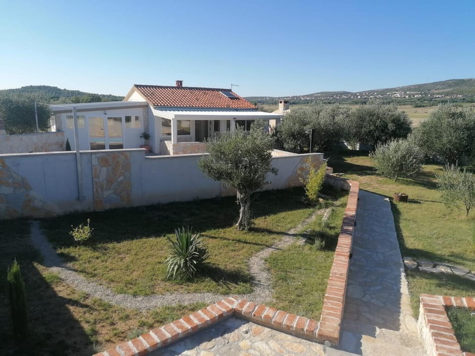 Holiday home with private pool and mini golf Fjaka, Zadar region House in Zadar County
