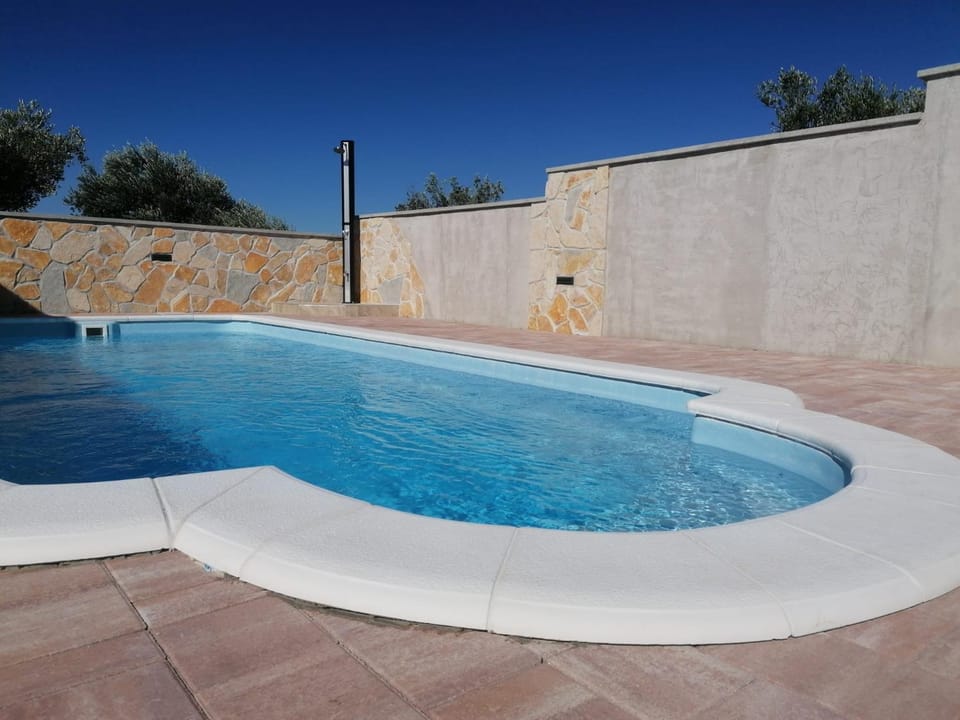 Holiday home with private pool and mini golf Fjaka, Zadar region House in Zadar County
