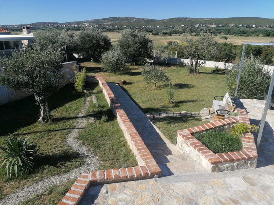 Holiday home with private pool and mini golf Fjaka, Zadar region House in Zadar County