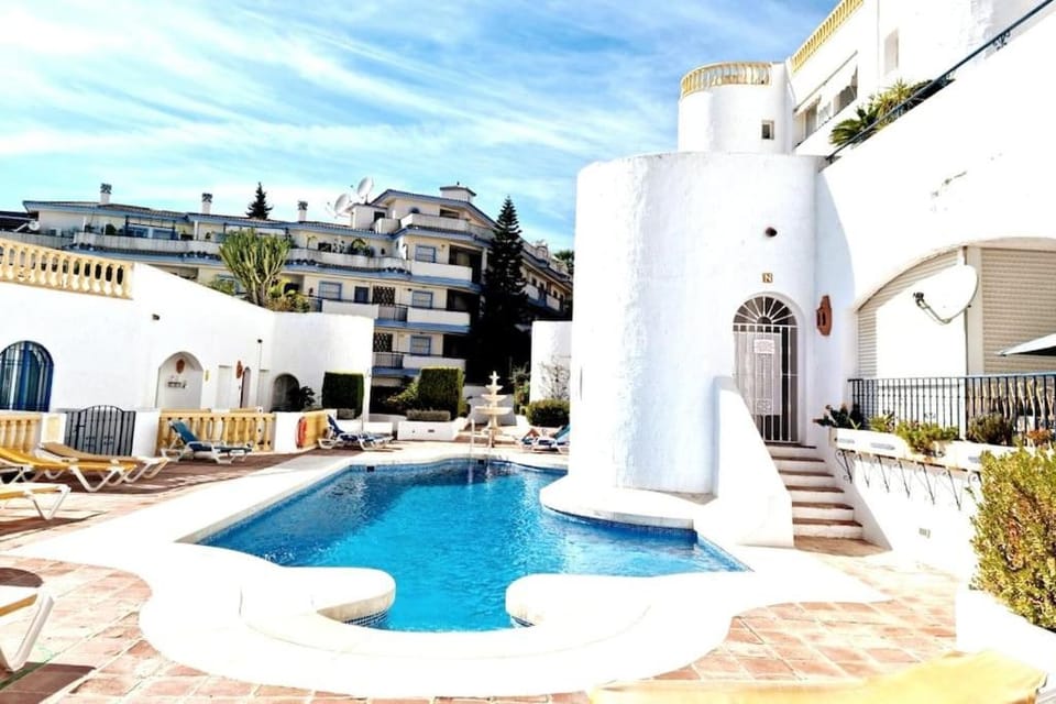 Property building, Patio, Pool view, Swimming pool, sunbed