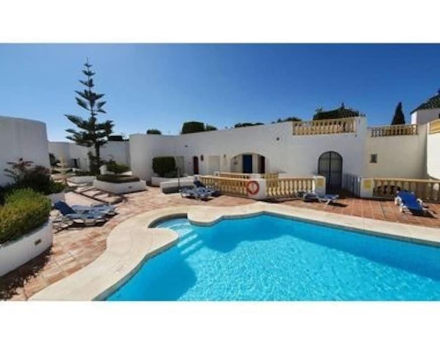 Property building, Pool view, Swimming pool, sunbed