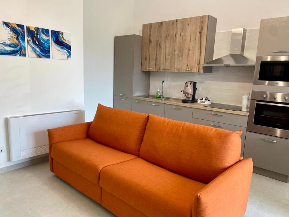 Kitchen or kitchenette, Living room, Seating area, stove
