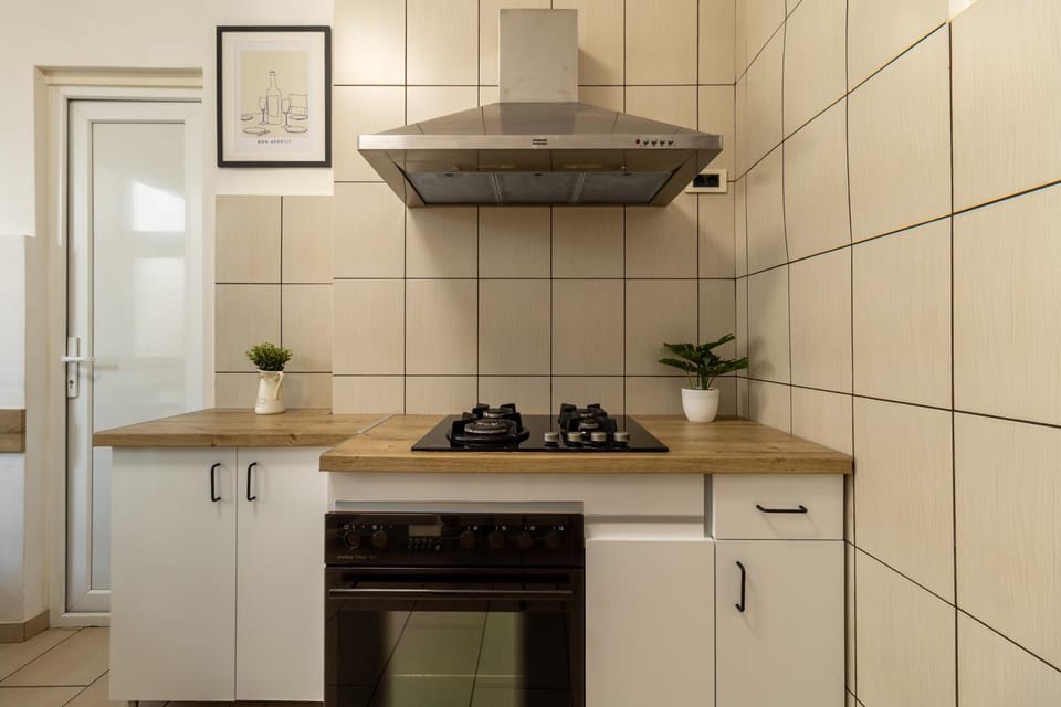 Kitchen or kitchenette, stove