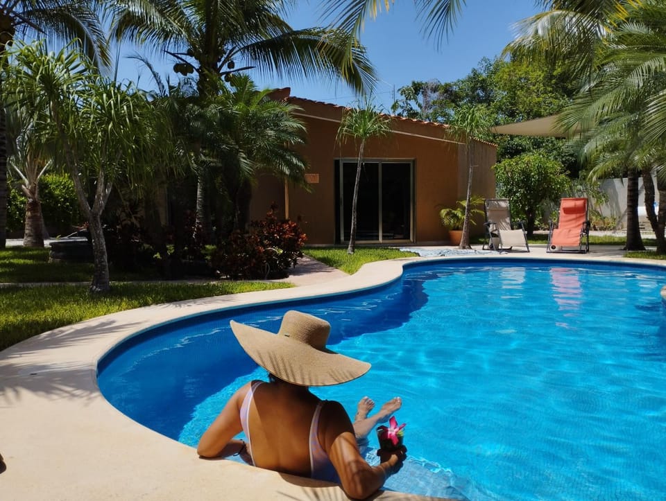 Property building, Day, Pool view, Swimming pool, sunbed