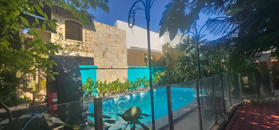 Property building, Patio, Day, Garden, Garden, View (from property/room), Garden view, Pool view, Swimming pool
