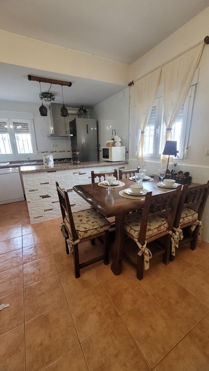 Kitchen or kitchenette, Dining area, Garden view, Pool view, dishwasher, microwave