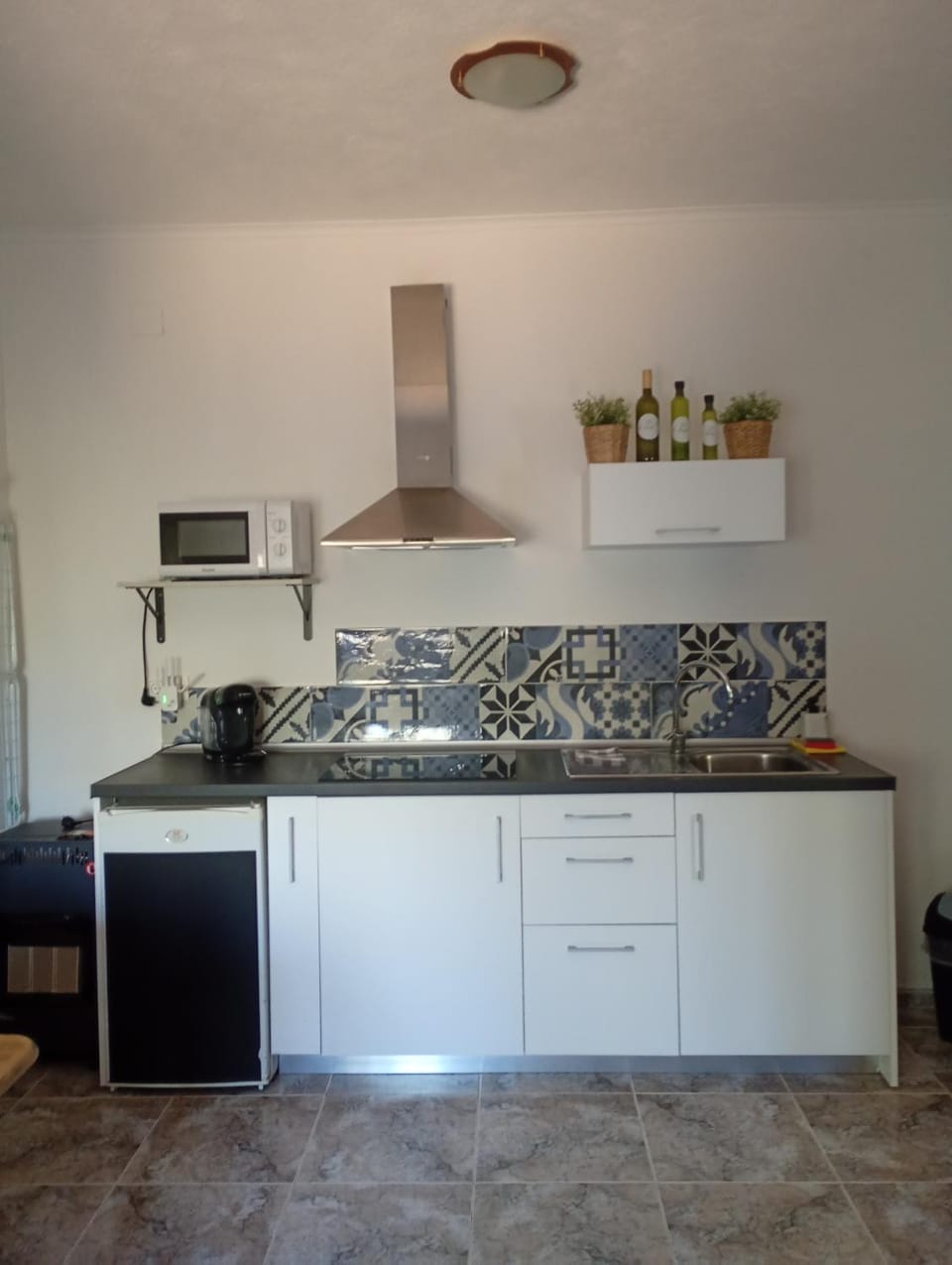 Kitchen or kitchenette, stove