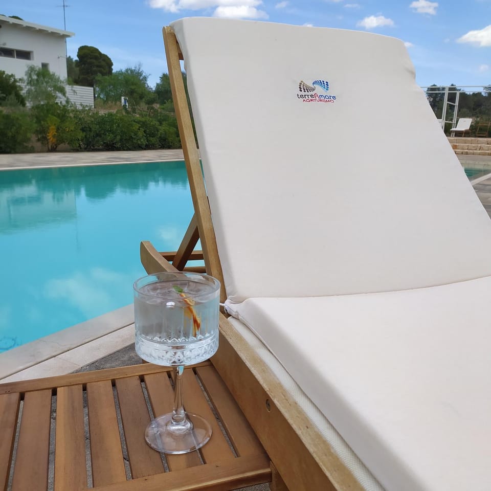 Swimming pool, sunbed