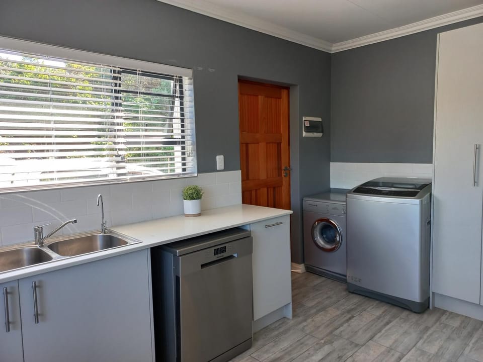 Kitchen or kitchenette, dishwasher, washing machine, dryer, kitchen