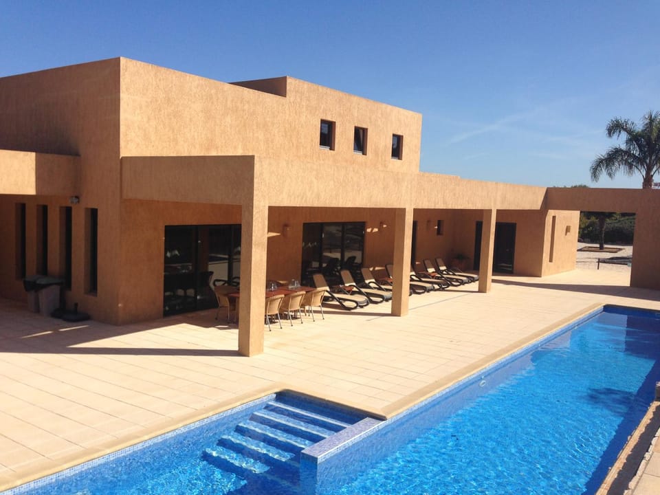 Property building, Swimming pool, sunbed