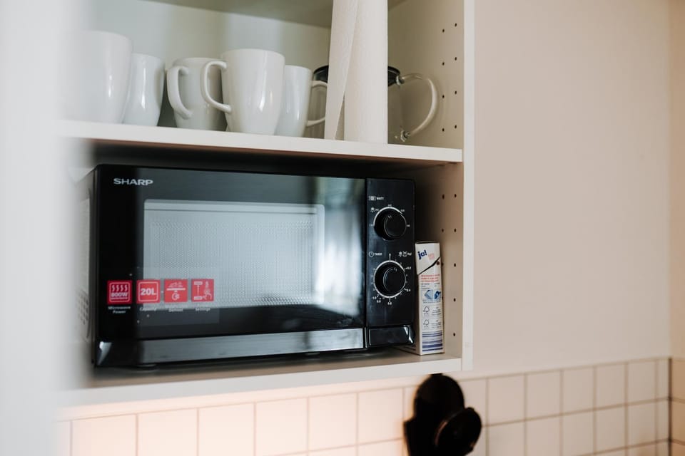 Kitchen or kitchenette, microwave