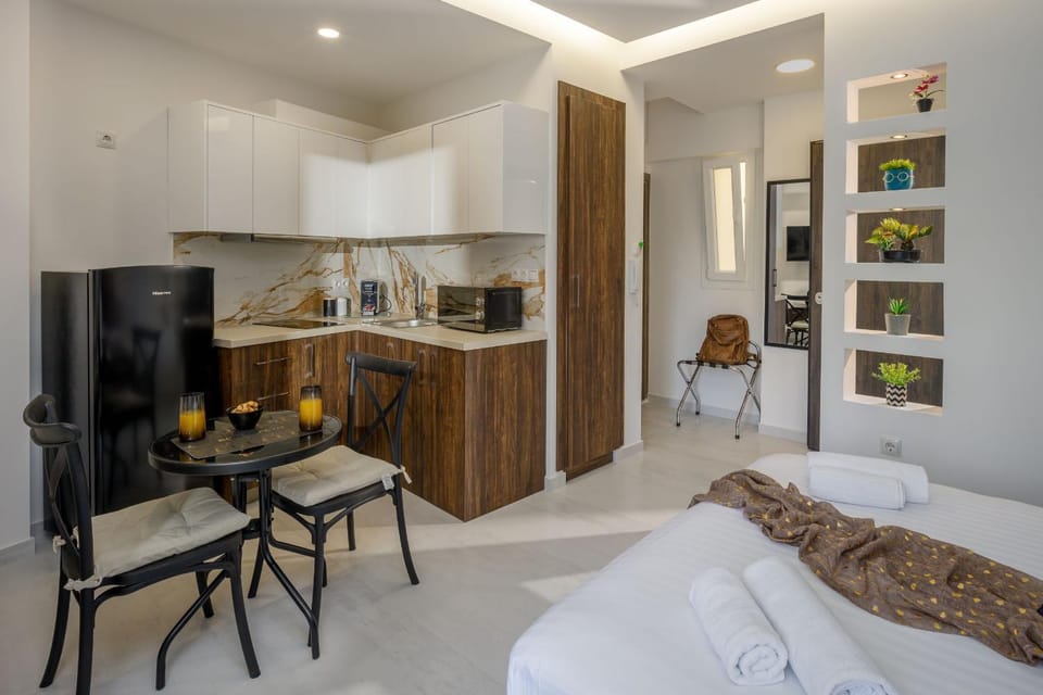 Bed, TV and multimedia, Coffee/tea facilities, Kitchen or kitchenette, Photo of the whole room, Dining area, minibar, stove, toaster