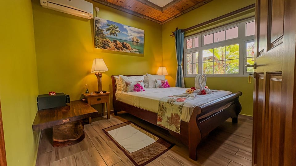 Bed, Photo of the whole room, Bedroom, towels, air conditioner
